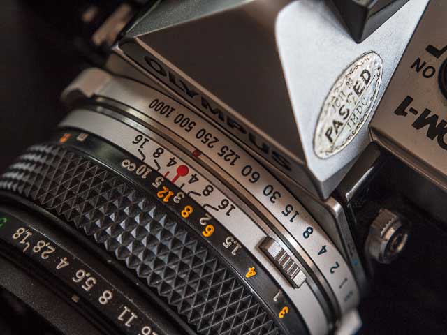 Olympus OM-1 camera, shutter speed dial detail