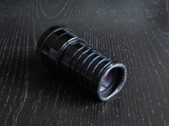 Isco-Optic V/S-Projar 90mm f/2.4 MC lens with Black Tack applied to the base.