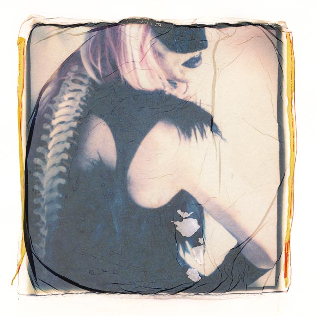 Emaulsion lift print made without cutting off the entire white border of the Polaroid print
